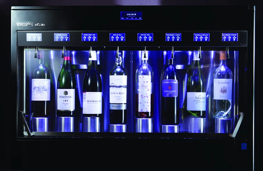 Black Enomatic Elite wine dispenser with multiple bottles and taps